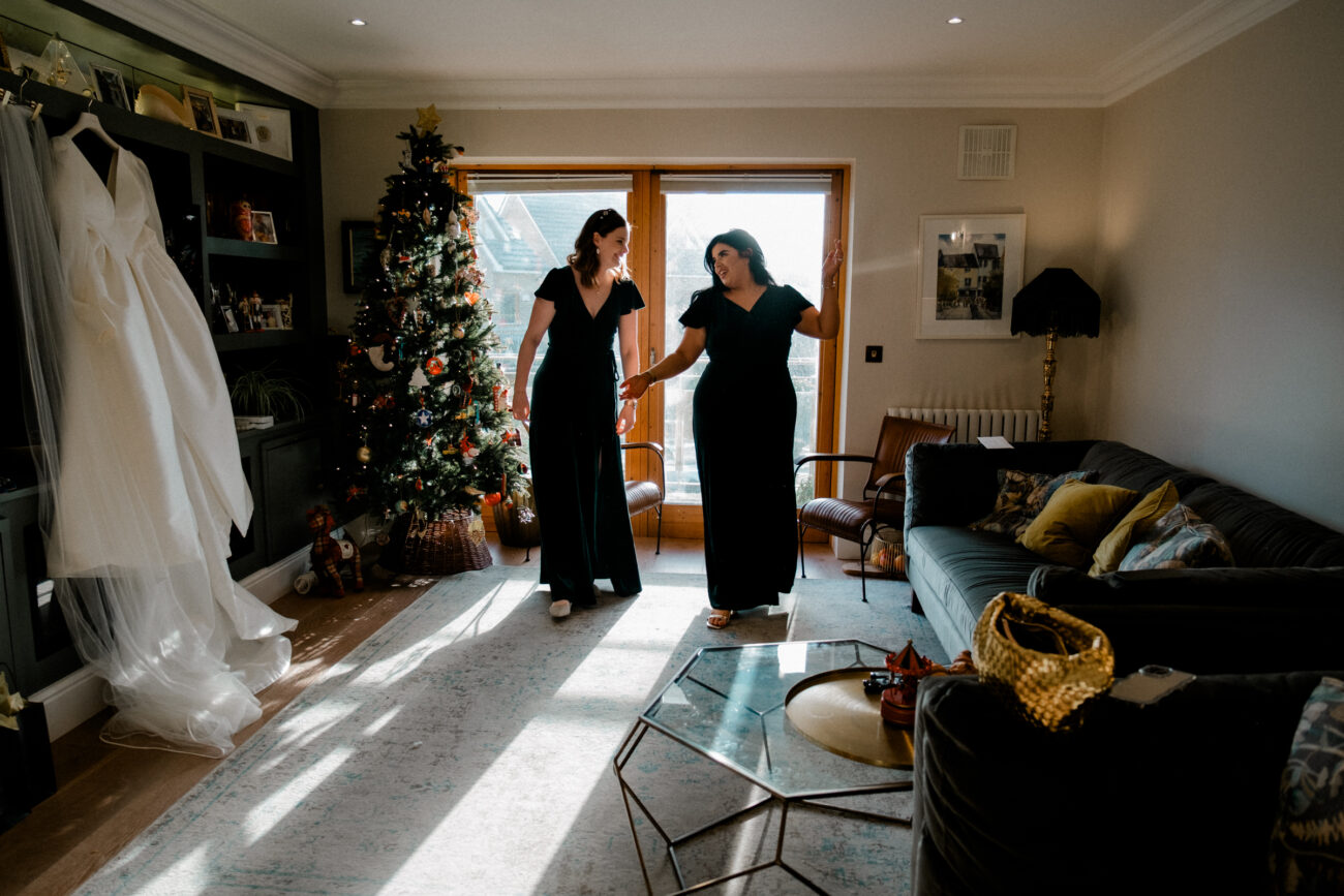 bridesmaids practicing walking down the aisle. Candid wedding photography