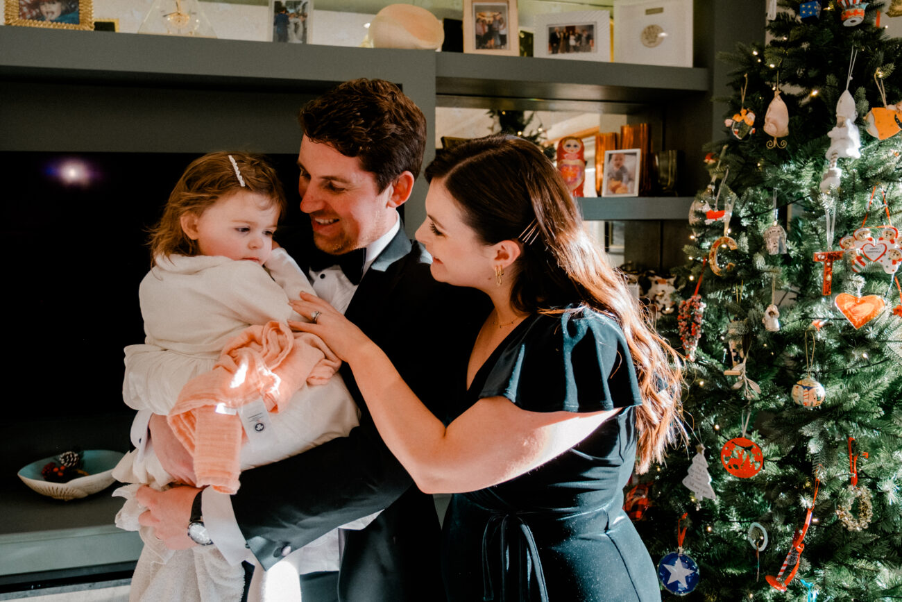 parents doting on their little girl, candid wedding photographer, powerscourt house 
wedding