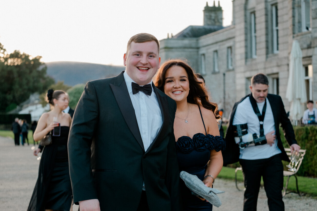 guests having a fun pose for the camera during cocktail hour. Wedding at Powerscourt Estate
