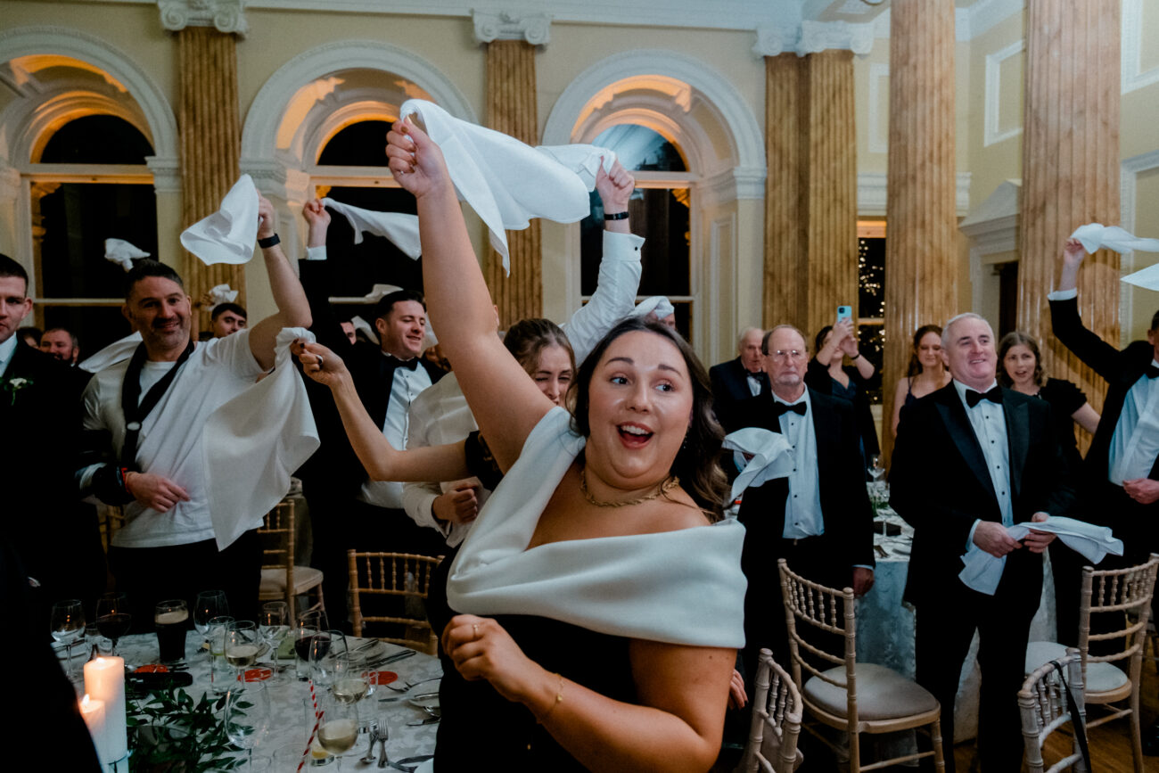 Guests flying their napkins in celebration