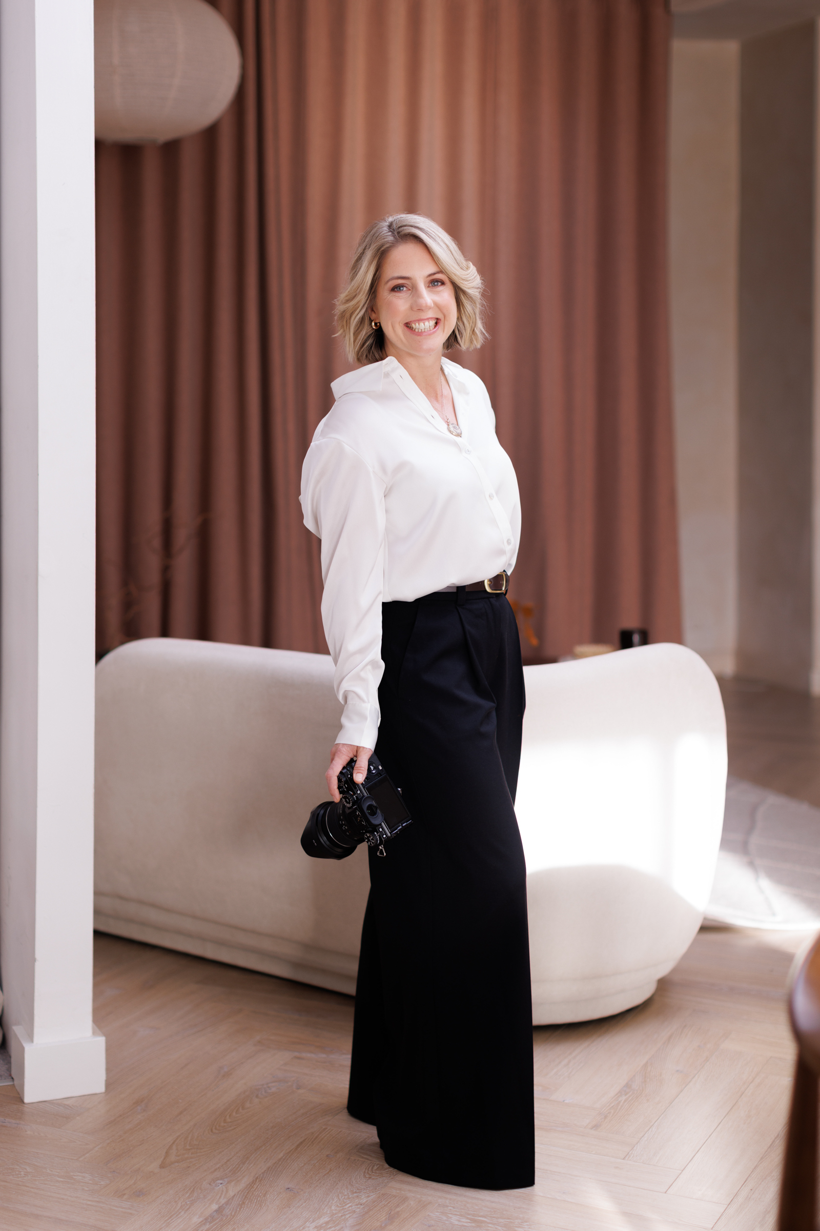 Bride and groom walking in the butterfly garden at Killashee Hotel, Killashee Hotel wedding in dublin Ireland | Dena Shearer Photography