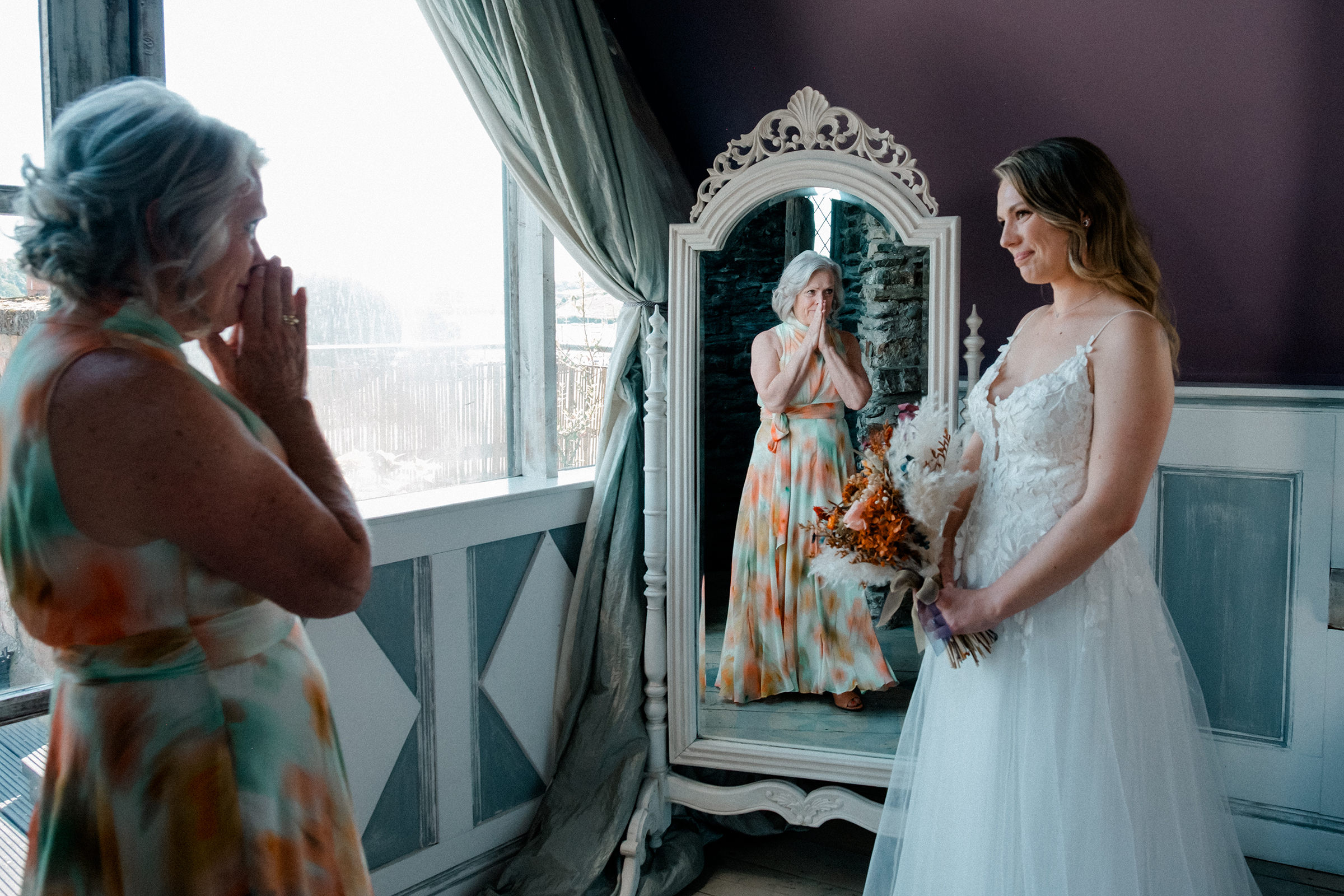 bride and groom facing each other at Dublin city hall balcony