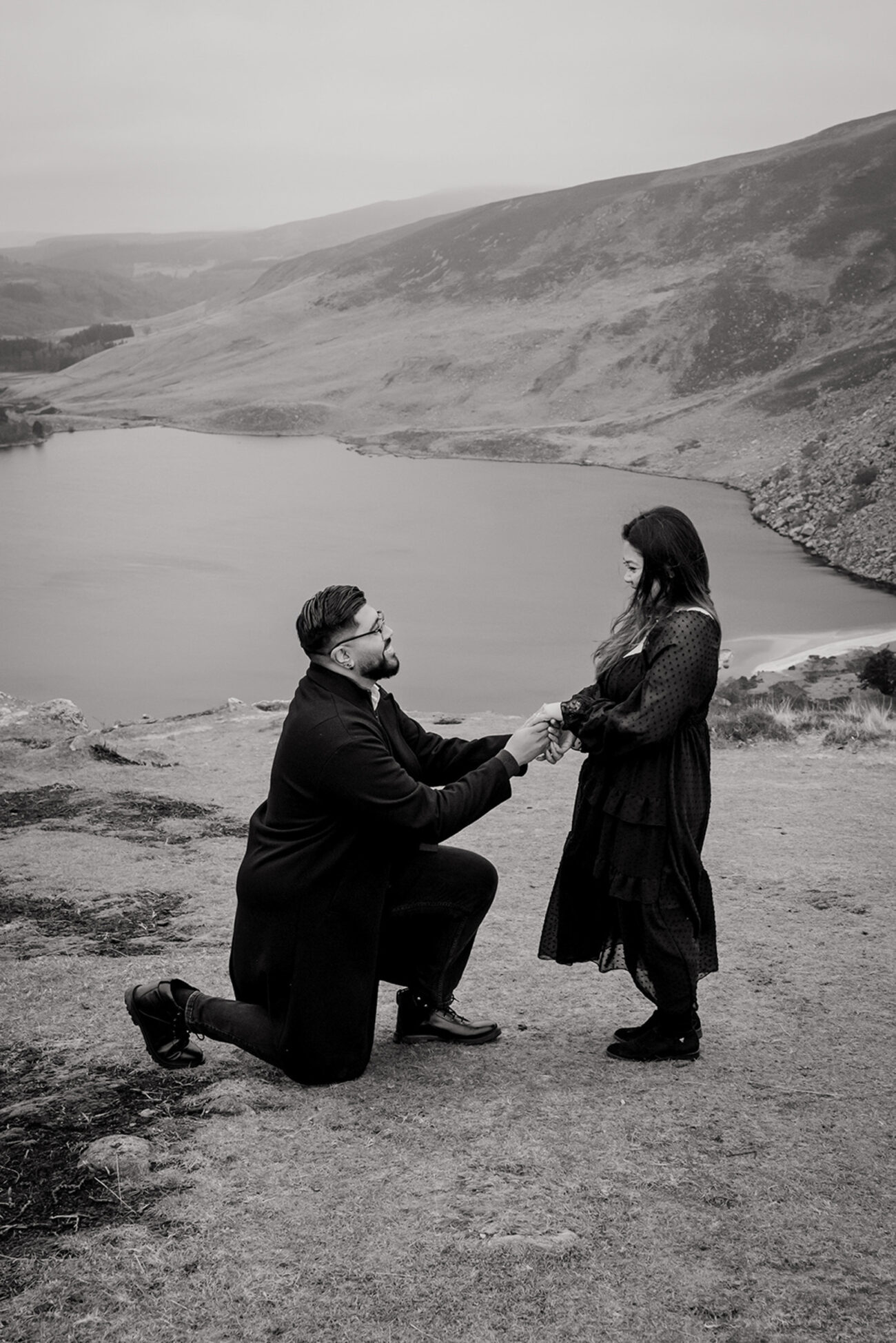 man proposing to his partner in Lough Tay, Wicklow