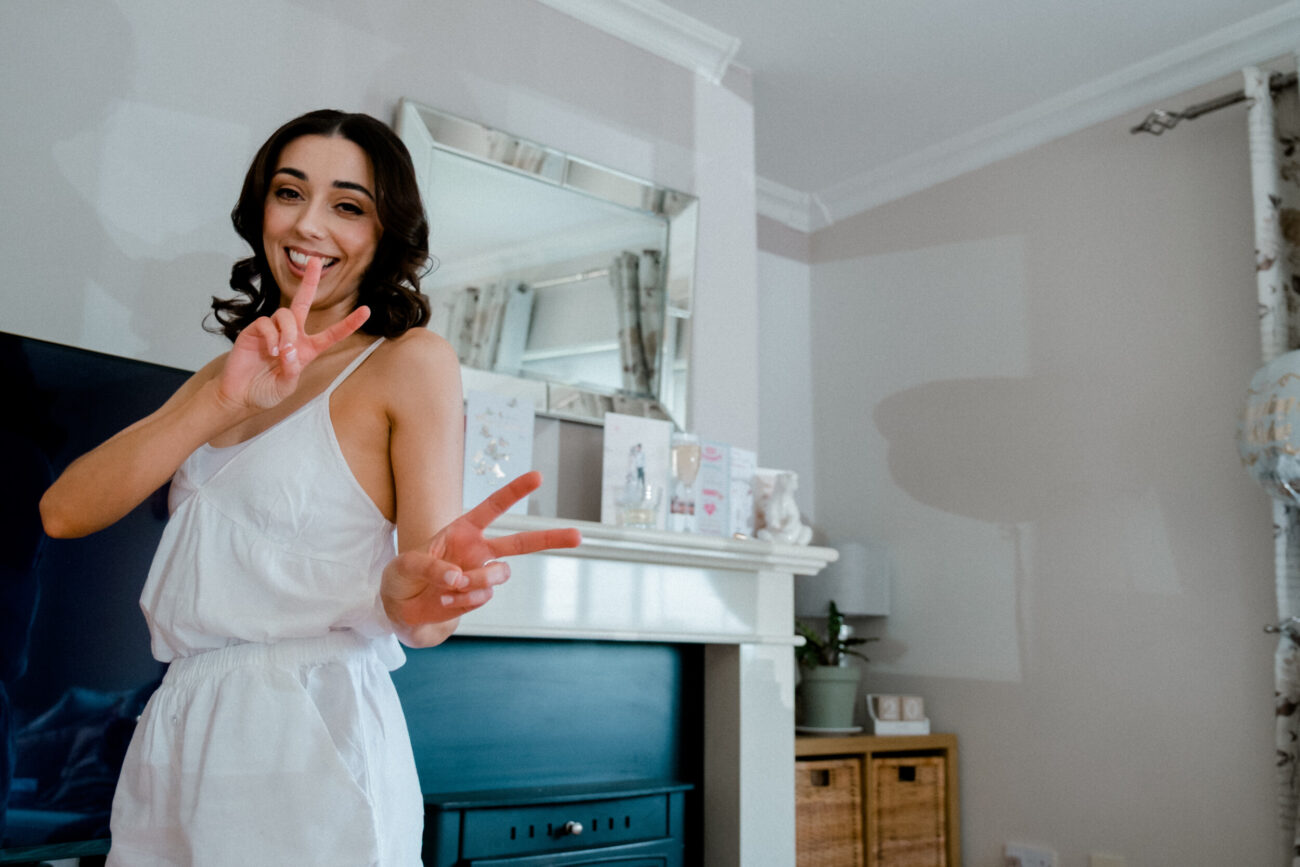 bride laughing into the camera at bridal prep house in Kildare wedding