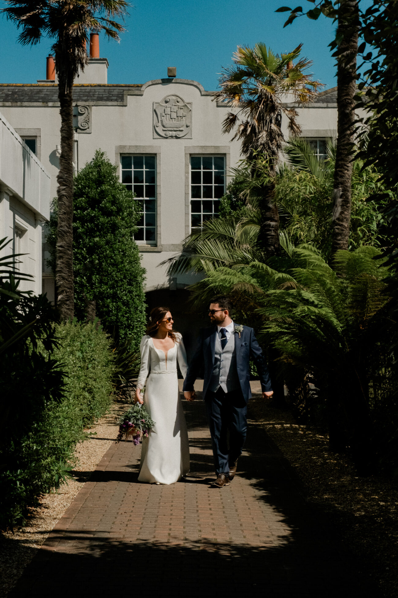 couple walking together on the grounds of Portmarnock Resort