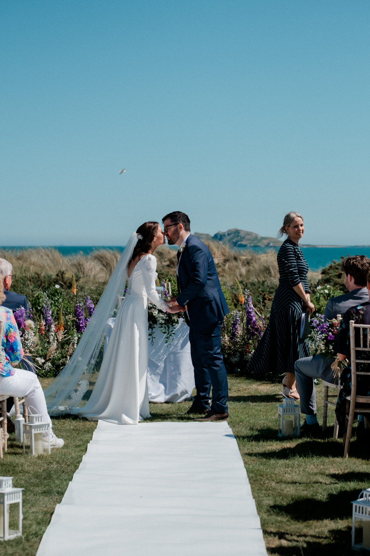 Portmarnock Resort Wedding Photographer capturing the first Kiss 