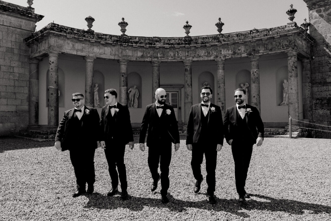 groom poses for wedding portraits Russborough House, 