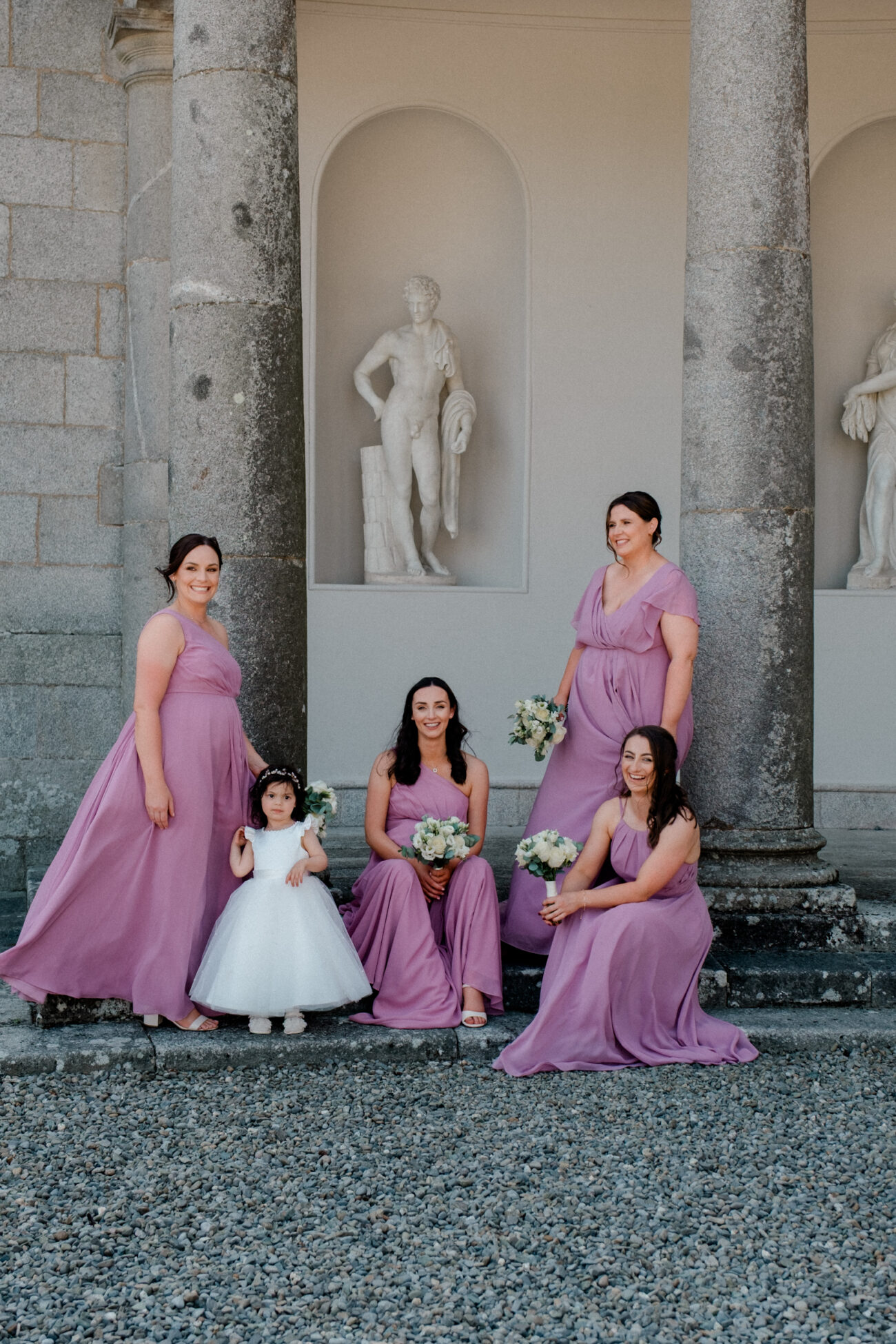 bridemaid poses for wedding portraits Russborough House, 