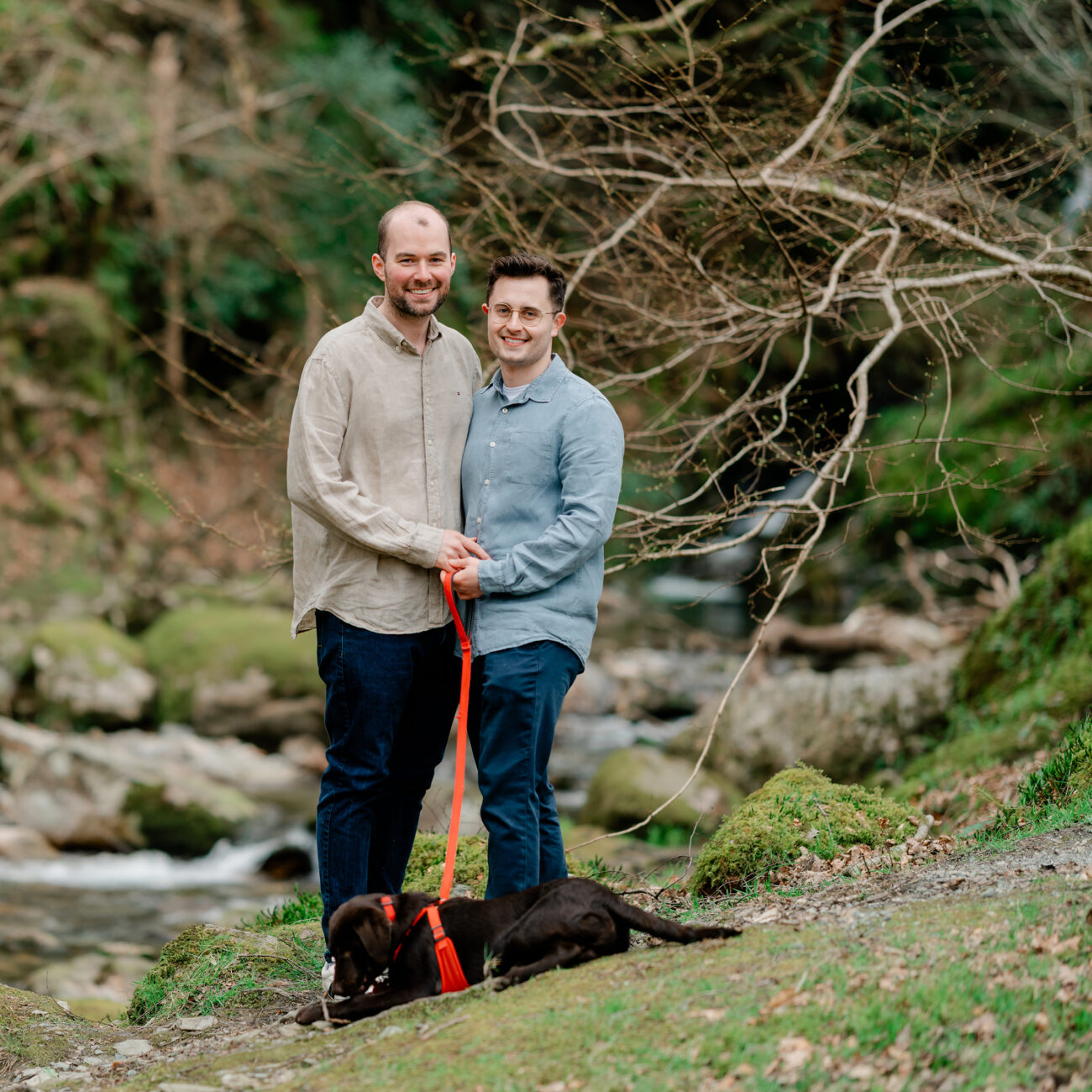 Couple and their dog at Glendalough waterfall
